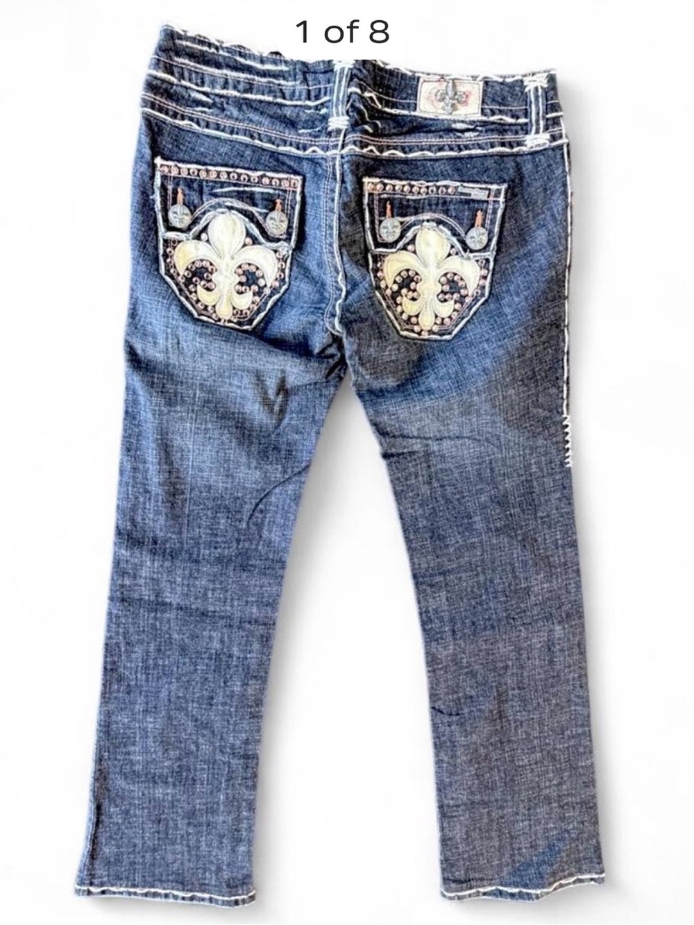 Laguna Beach Jean Co. women’s  Boot Cut Jeans with Fleur Embellished Back Pocket